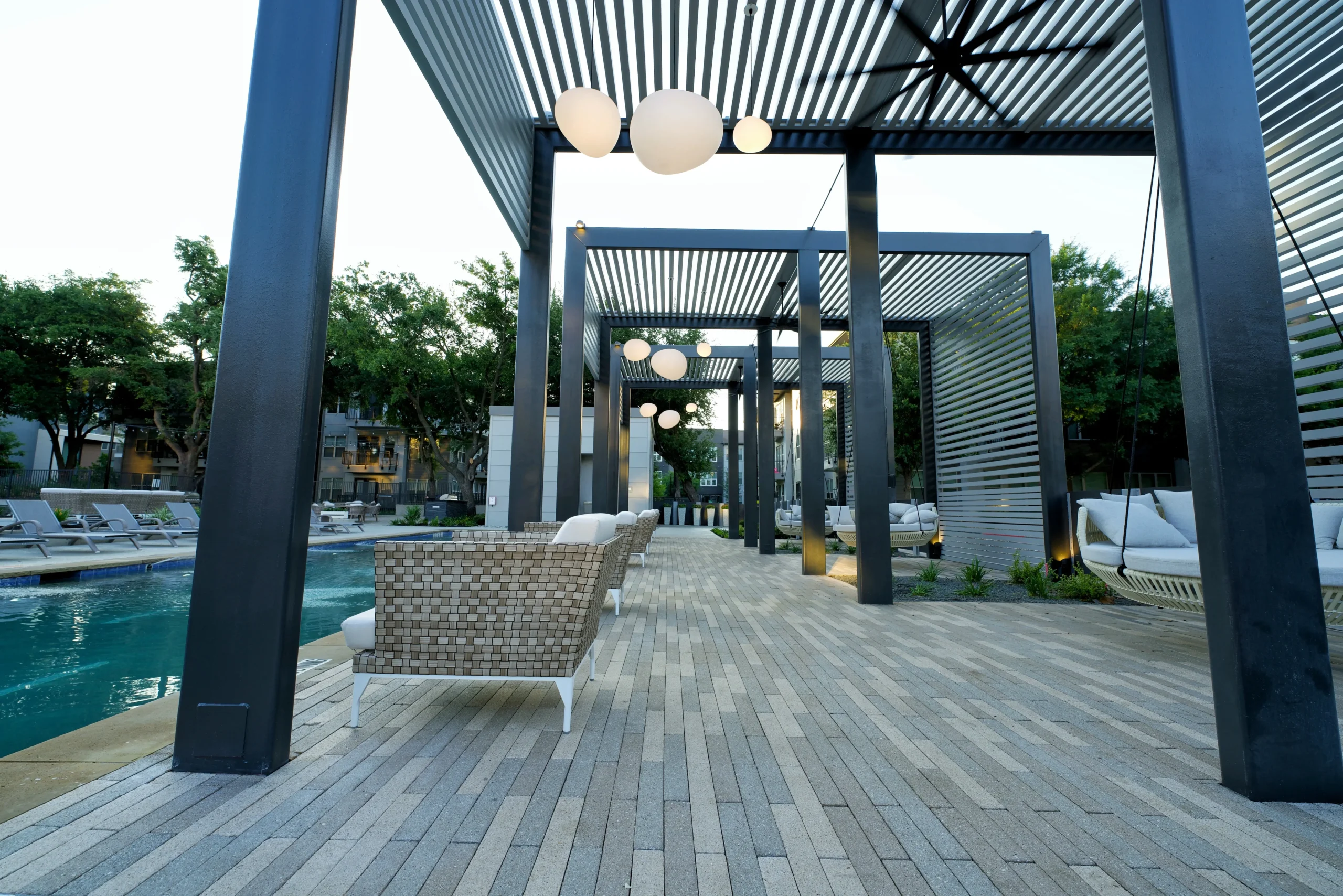 Linear pergola walkway with lounge seating